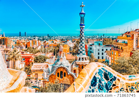 :Gorgeous and amazing Park Guel in Barcelona. In 1984 park has been declared UNESCO by the World heritage of mankind. Park Guell (1914) is the famous architectural town 71863745