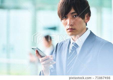 A young businessman A young businessman 71867498