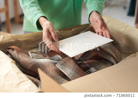 Packing new clothes Packing new clothes 71868011