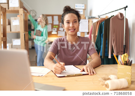 Tailor making an order 71868058