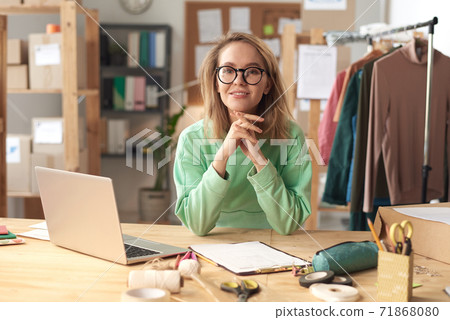 Fashion designer working at office 71868080