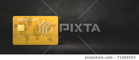 Gold credit card on a black concrete background Gold credit card on a black concrete background 71868505