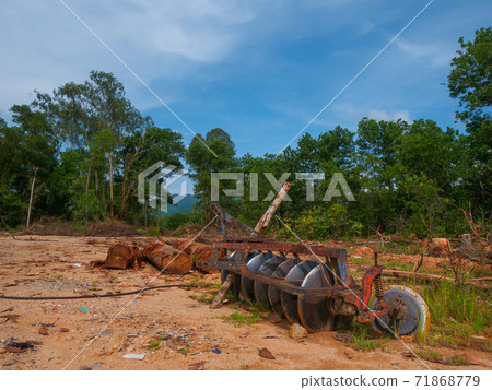 Tree-cut forests and forestry machinery (Khao Lak, Phang Nga Province, Kingdom of Thailand) 71868779