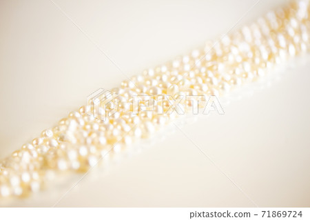 Pearl necklace up and white background and copy space Pearl necklace up and white background and copy space 71869724