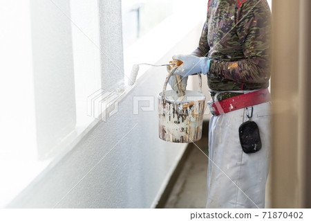 A paint shop that paints the exterior walls of a house A paint shop that paints the exterior walls of a house 71870402