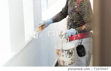 A paint shop that paints the exterior walls of a house A paint shop that paints the exterior walls of a house 71870407