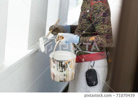 A paint shop that paints the exterior walls of a house A paint shop that paints the exterior walls of a house 71870439