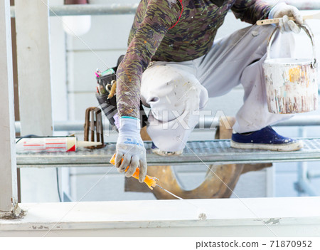 A paint shop that paints the exterior walls of a house A paint shop that paints the exterior walls of a house 71870952