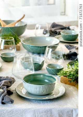 Christmas table setting with ceramic tableware Christmas table setting with ceramic tableware 71872763