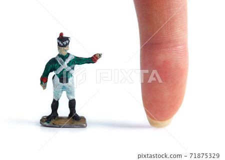 Image of vintage metal soldier's figurine on the white background Image of vintage metal soldier's figurine on the white background 71875329