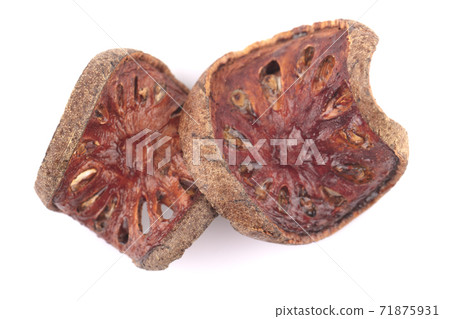 Dried bael an isolated on a white background Dried bael an isolated on a white background 71875931