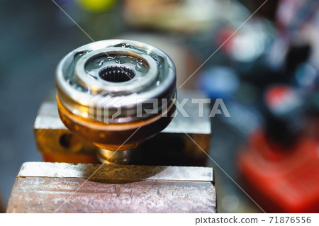 ATV constant-velocity CV joint repair in old garage 71876556