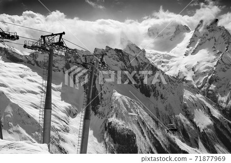 Black and white view on chair-lift at ski resor Black and white view on chair-lift at ski resor 71877969