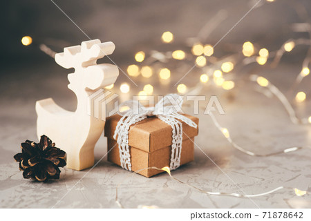 The figure of the reindeer, gift box and pine cone. The figure of the reindeer, gift box and pine cone. 71878642