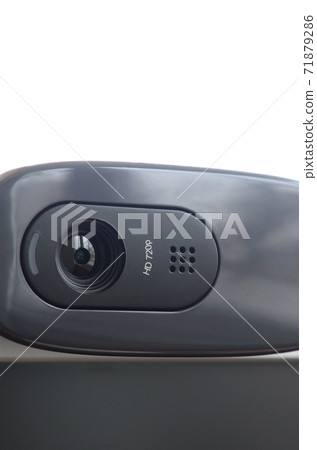 A modern web camera is installed on the body of a flat screen monitor. Device for video communication and recording of high quality video A modern web camera is installed on the body of a flat screen monitor. Device for video communication and recording of high quality video 71879286