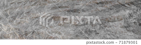 Texture of cellophane material with many folds and bends Texture of cellophane material with many folds and bends 71879301