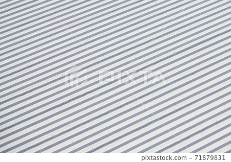 Metal gray roof with rhythmic parallel relief directions Metal gray roof with rhythmic parallel relief directions 71879831