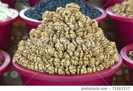 Shelled walnuts at a market in Uzbekistan 71882557