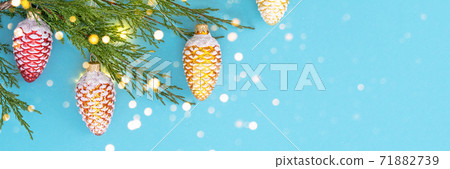 Christmas toys cones on the tree branch. Christmas toys cones on the tree branch. 71882739