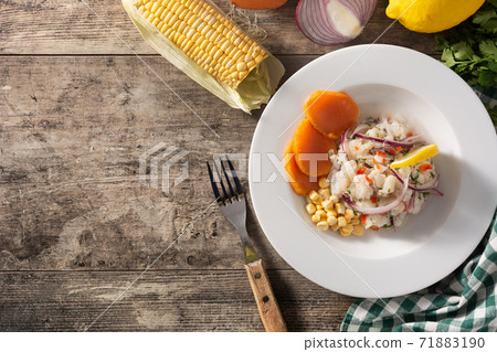 Traditional peruvian ceviche with fish, sweet potato, corn and vegetables Traditional peruvian ceviche with fish, sweet potato, corn and vegetables 71883190