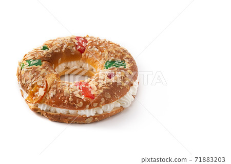 Epiphany cake "Roscon de Reyes" isolated on white background Epiphany cake "Roscon de Reyes" isolated on white background 71883203