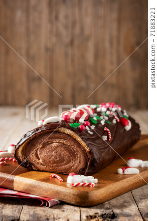 Chocolate yule log christmas cake Chocolate yule log christmas cake 71883221