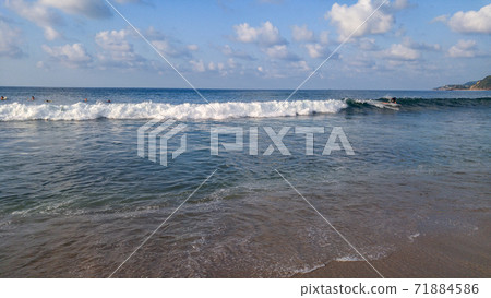 Sayulita beach beautiful sunset with palm trees at Sayulita in Mexico. Sayulita beach beautiful sunset with palm trees at Sayulita in Mexico. 71884586