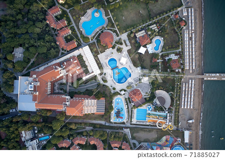 Aerial view of water park and coastline of resort hotel. Aerial view of water park and coastline of resort hotel. 71885027
