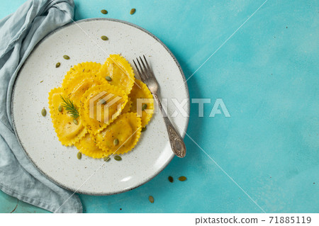 Homemade Pumpkin Ravioli with butter. 71885119