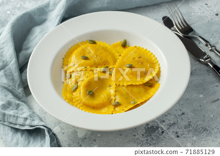 Homemade Pumpkin Ravioli with butter. 71885129