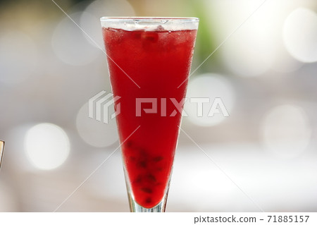 Glass with fresh pomegranate juice. Glass with fresh pomegranate juice. 71885157