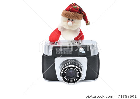 Santa Claus and vintage camera on a white background for the New Year and Christmas 71885601