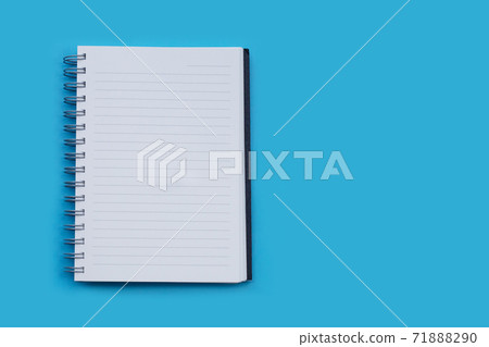 Open notebook on blue background. Top view Open notebook on blue background. Top view 71888290