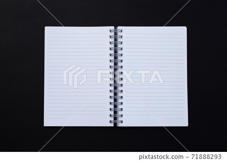 Open notebook on dark background. Top view Open notebook on dark background. Top view 71888293