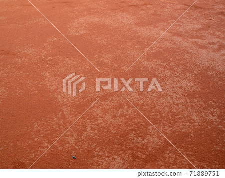 Red clay texture of tennis court. Surface of red sports field 71889751