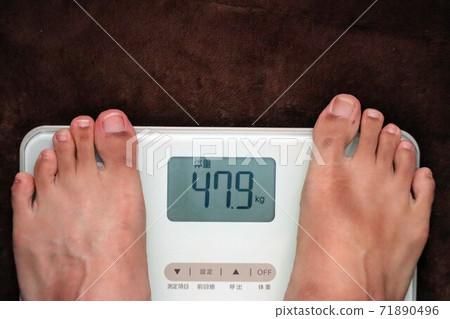 Close-up of weight lost due to illness Close-up of weight lost due to illness 71890496