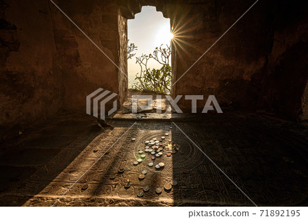The scenery of sunshine on the Buddha's footprint on the top of Khao Nor in Nakhon Sawan. 71892195