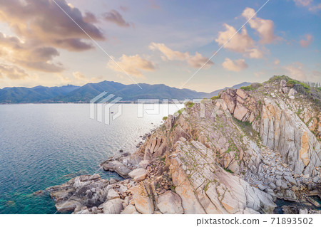 Aerial view of ocean waves and fantastic Rocky coast 71893502