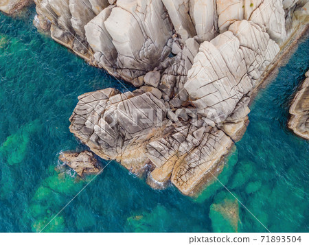 Aerial view of ocean waves and fantastic Rocky coast 71893504