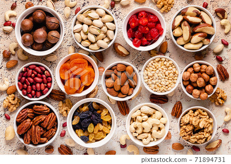 Nuts and dried fruits assortment. 71894731