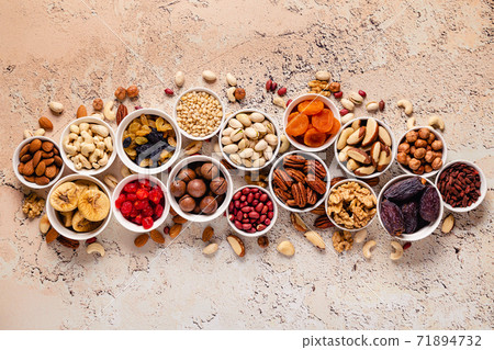 Nuts and dried fruits assortment. Nuts and dried fruits assortment. 71894732