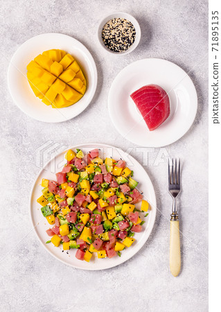 Tuna mango avocado salad tartare. Tuna mango avocado salad tartare. 71895135