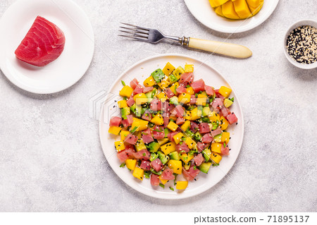 Tuna mango avocado salad tartare. Tuna mango avocado salad tartare. 71895137