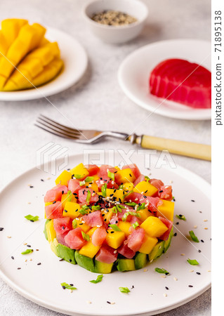 Tuna mango avocado salad tartare. 71895138