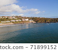 Looking Into Langland Bay in Gower, Wales, UK from the sea on a clean late Autumn day. Blue skies with some clouds 71899152
