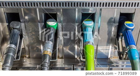 gas pump nozzles in a row gas pump nozzles in a row 71899389