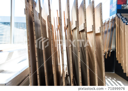 Samples of wooden furniture MDF profiles in sunlight. selective focus 71899976