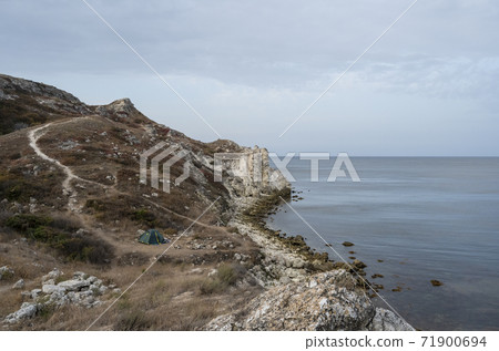 Dzhangulskoe landslide coast nature reserve in the morning in the Republic of Crimea, Russia. September 27, 2020 Dzhangulskoe landslide coast nature reserve in the morning in the Republic of Crimea, Russia. September 27, 2020 71900694