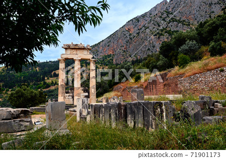 Ruins of Tholos of ancient Greek goddess Athena Pronaia in Delphi, Greece. Doric columns. UNESCO World heritage site. Ruins of Tholos of ancient Greek goddess Athena Pronaia in Delphi, Greece. Doric columns. UNESCO World heritage site. 71901173