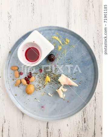 leftovers of a breakfast on a wooden table leftovers of a breakfast on a wooden table 71901185